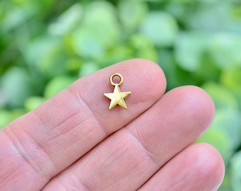 BULK 100 Star Gold Tone 11mm   Charms GC6271