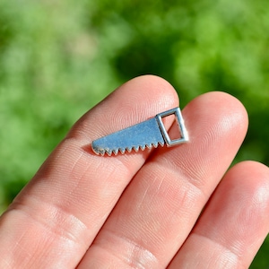 1 Hand Saw Silver Tone Charm SC5811