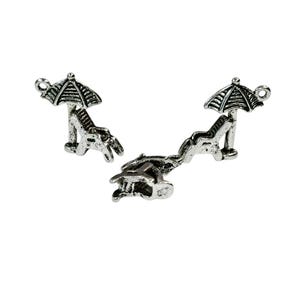 May include: Three silver charm pendants in the shape of a beach chair with an umbrella. The charms are perfect for adding a summery touch to jewelry.