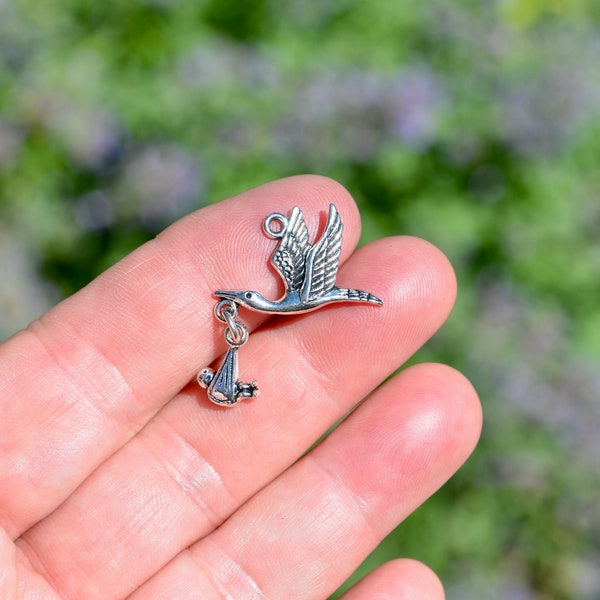 1  Flying Stork with Baby Silver Tone Charm SC2027