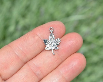 BULK 50  Maple Leaf Silver Tone Charms SC2417