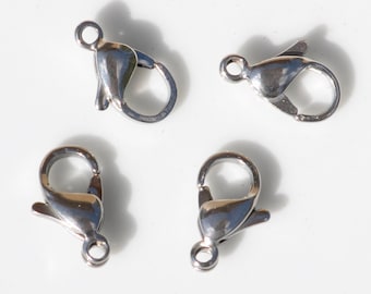 May include: Four shiny, silver-colored lobster claw clasps. Each clasp has a small loop at one end and a curved, spring-loaded closure at the other. The clasps are designed for jewelry making and crafting.