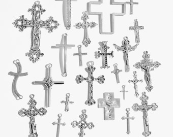 May include: A collection of silver-toned cross charms with various designs, including ornate, simple, and crucifix styles.