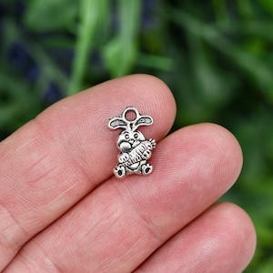 BULK 50   Bunny Rabbit with a Carrot Silver Tone Charms SC1724