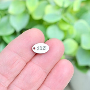 Year 2021, Stainless Steel  Custom Laser Engraved  Oval Charm CC88