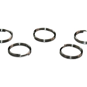 May include: Five silver key rings, each with a double loop design.