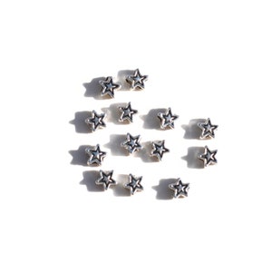 BULK 50  Tiny 4mm Silver Tone Star Shaped Beads  BD238