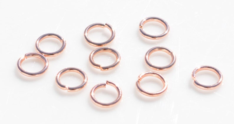 100 Rose Gold Tone 6mm Jump Rings F477