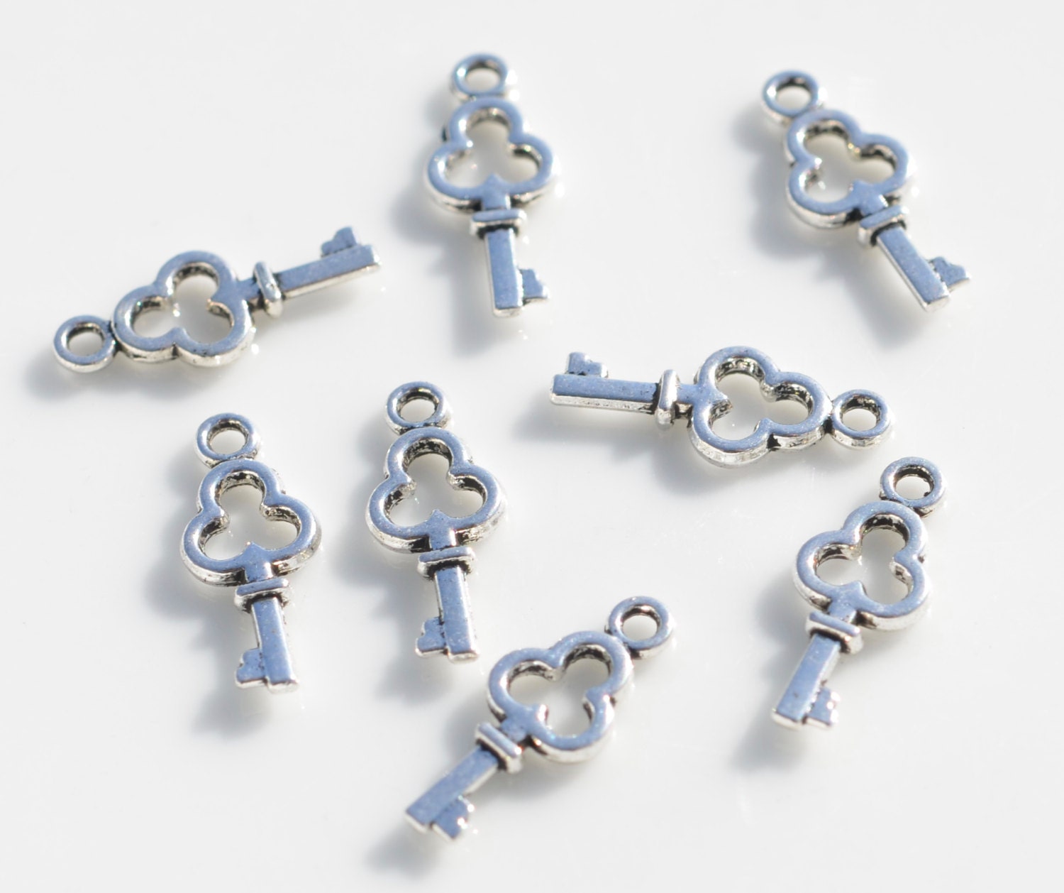 1 Tiny Key Silver Tone Charm SC5639 - Etsy
