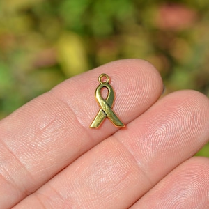 20   Cancer Awareness Gold Tone  Ribbon Charms GC2360