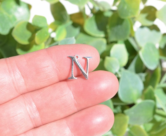 BULK 10 Stainless Steel Nu Greek Letter Charms SC7007 