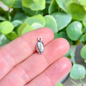 BULK 50  Football Silver Tone Charms SC5951