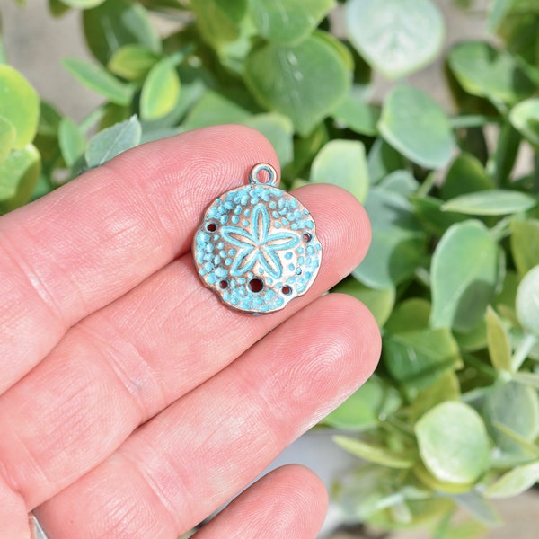 1  Sand Dollar Copper Tone  with Green, Blue Patina Charm BC5941