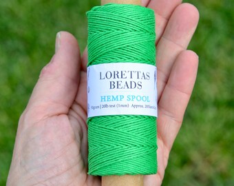 May include: A spool of green hemp cord, labeled "Loretta's Beads Hemp Spool 50 gram | 20lb test (1mm) Approx. 205 feet"