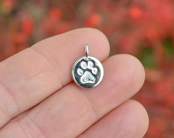 1 Dog Paw Silver Tone Charm SC4055