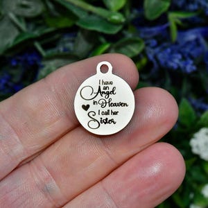 I have an Angel in Heaven I call her Sister,  Laser Engraved Stainless Steel Charm CC1921