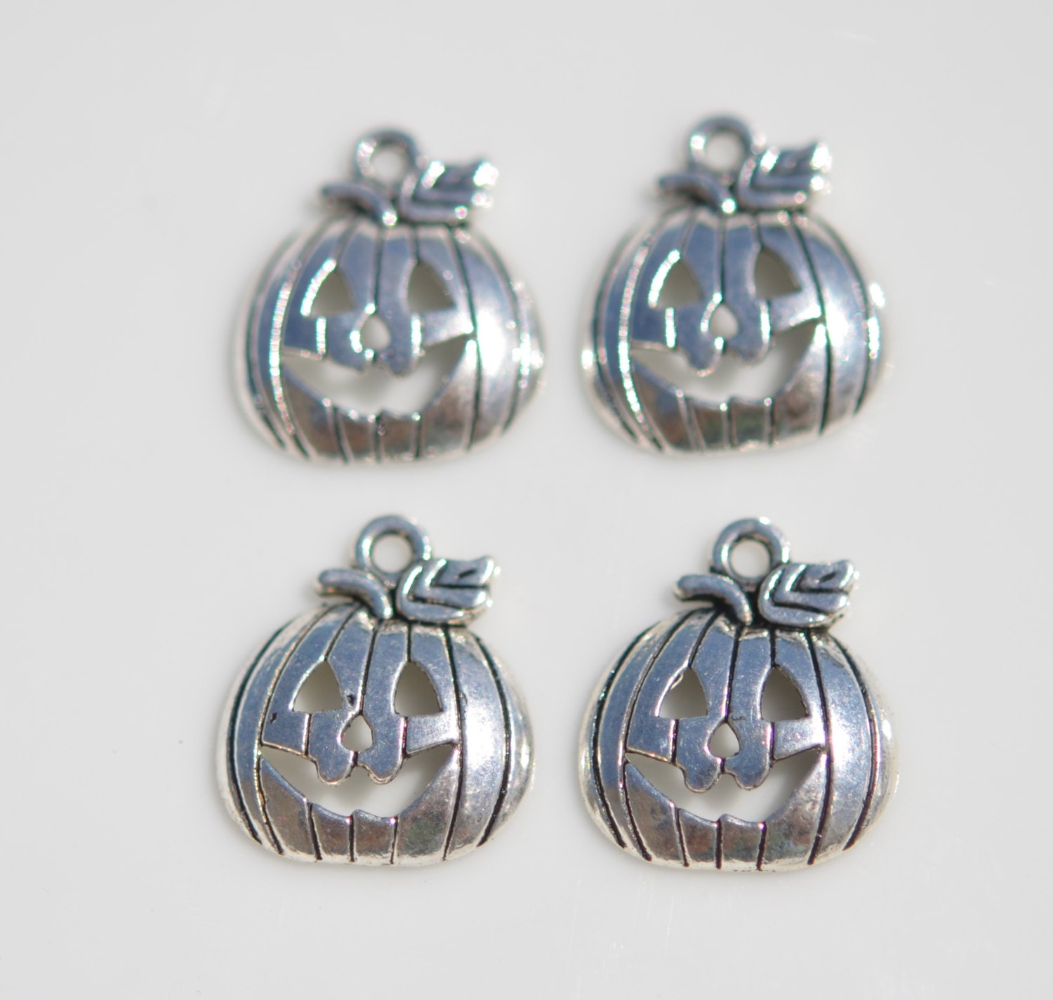 4 Jack O'Lantern Charms Antiqued Silver Halloween Findings Pumpkin Pendants