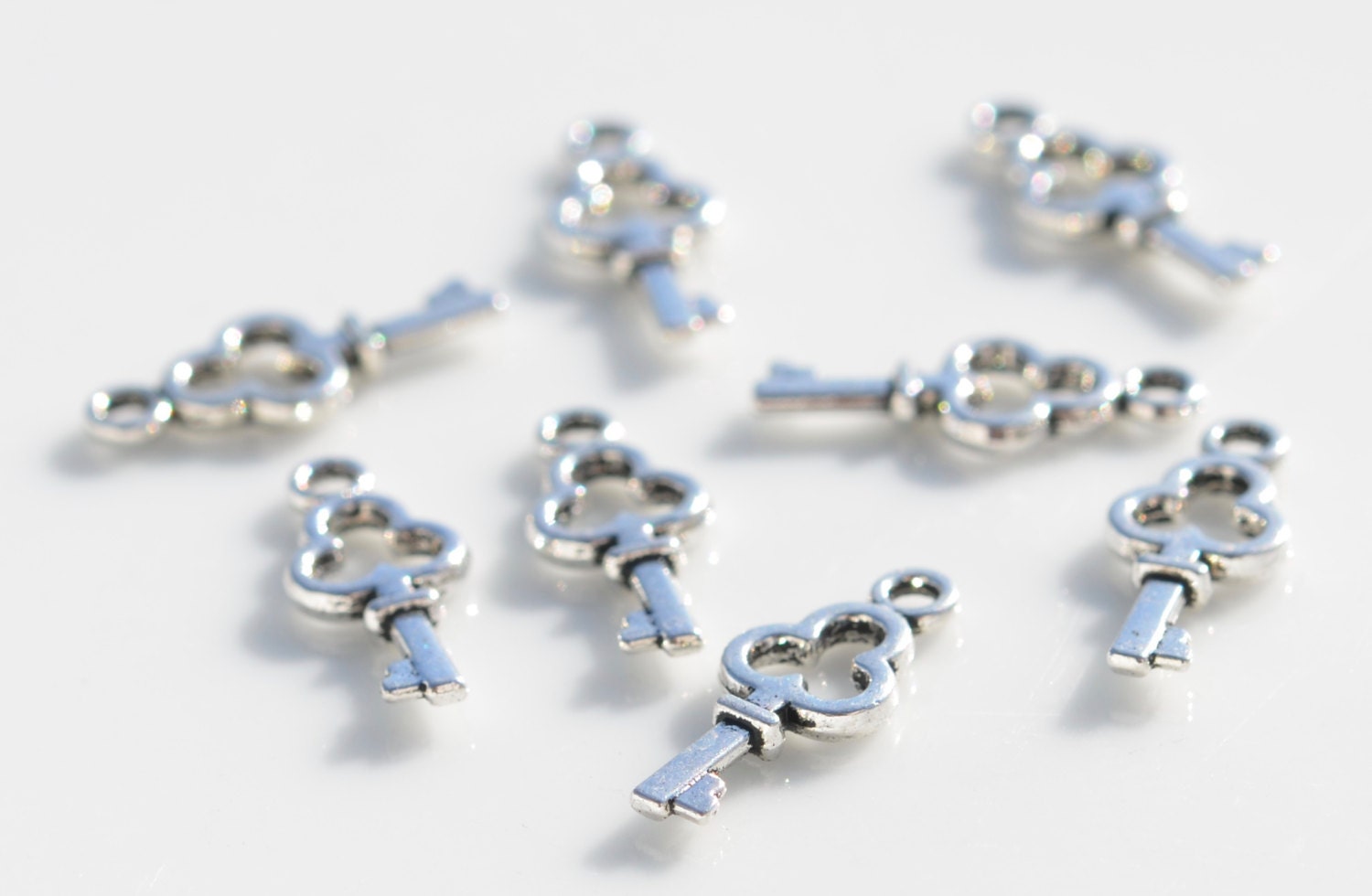 1 Tiny Key Silver Tone Charm SC5639 - Etsy