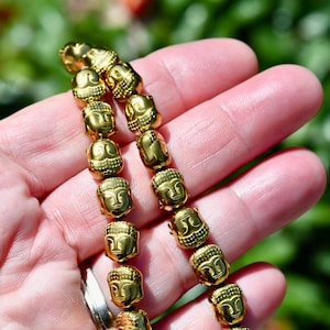20  Gold Hematite Buddha Beads BD1173