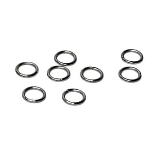 Op de afbeelding: Een verzameling van zeven kleine, ronde metalen buigringen. Elke ring heeft een gladde, donkergrijze afwerking en een enkel zichtbaar snijpunt langs de omtrek, wat aangeeft dat ze zijn ontworpen voor het verbinden van sieradenonderdelen.