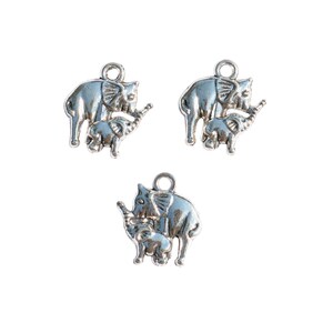 May include: Three silver charm pendants featuring a mother elephant and baby elephant. The elephants are facing right and the baby elephant is standing on the mother's foot.