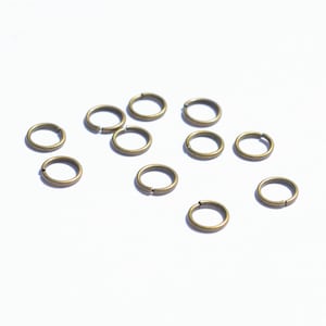 25 Bronze Tone 7mm Jump Rings F110