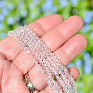 1 Strand of Clear Crystal 4mm x 3.5mm Faceted Round Beads  BD529