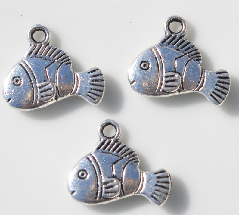 BULK 50 Fish Silver Tone Charms SC2433