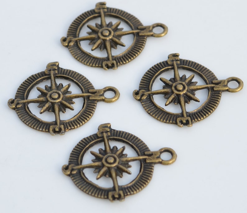 1 Compass Bronze Tone Charm BC6129