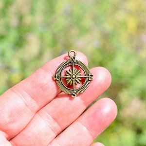 1 Compass Bronze Tone Charm BC6569