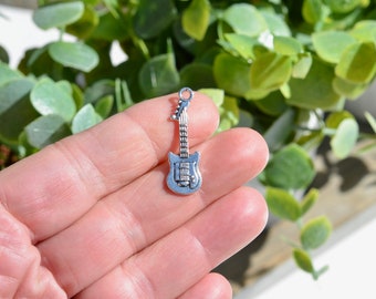 10 dijes de guitarra eléctrica en tono plateado SC3224