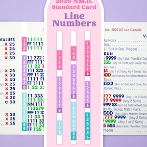 May include: A 2026 NMJL Standard Card Line Numbers reference guide printed on a light pink, rounded rectangular card. The card features three vertical columns with numbered sequences in pink, purple, and teal, alongside text and game rules.