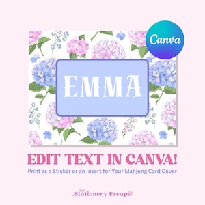 May include: A light blue rectangle with the name "EMMA" in white, surrounded by a floral pattern of pink and blue hydrangeas. The text "EDIT TEXT IN CANVA!" is below the rectangle, with a Canva logo in the upper right corner.