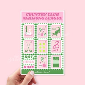 May include: A sticker sheet featuring Country Club Mahjong League designs. The sheet includes pink and green squares with illustrations of a swan, golf clubs, a crocodile, and other mahjong tiles. Text includes "WATERPROOF & DISHWASHER-SAFE STICKERS".