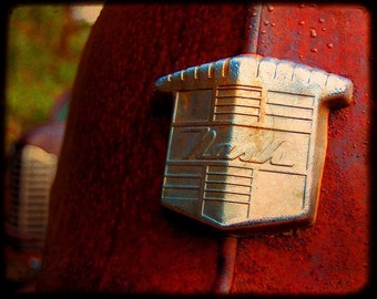 Rusty Cars - Garage Art - Automotive Art - Mr. Newman's Emblem - Rusty Old Car - Nash - Fine Art Photograph by Kelly Warren