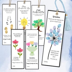 May include: A collection of seven rectangular paper bookmarks featuring various illustrations created with fingerprints, including a lightbulb, a tree, flowers, and a dandelion. Each bookmark displays religious text and quotes, with one bookmark featuring a light blue tassel.