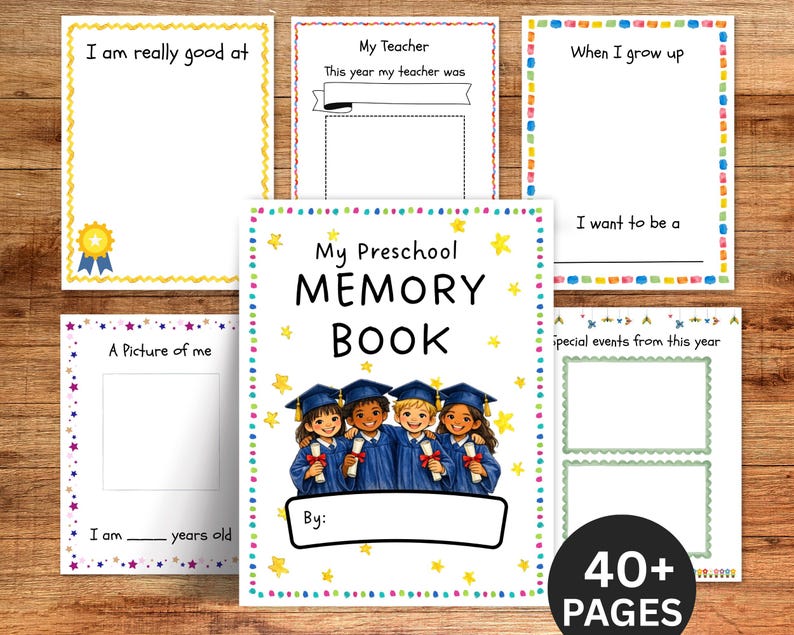 May include: A preschool memory book with a cover featuring illustrations of children in graduation gowns. The book includes pages for photos and writing prompts such as "I am really good at" and "When I grow up." The book has 40+ pages.