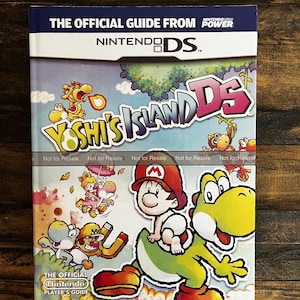 May include: A Nintendo DS game guide for Yoshi's Island DS. The cover features colorful illustrations of Yoshi, Baby Mario, and other characters from the game. The title is prominently displayed with the Nintendo DS logo.