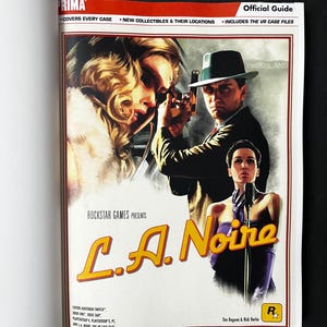 May include: A page from an official guide for the video game L.A. Noire. The cover features a man in a fedora holding a gun, a woman, and the game's title in yellow. The Prima logo is at the top.