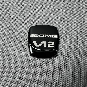 Emblème d'insigne de boîte de vitesses AMG V12 style pour Mercedes Benz W140 W463 W129 W124 W210 R129