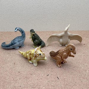 Hand-Painted Ceramic Dinosaur Figurines: Dino Collectibles