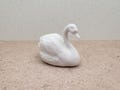 Glossy White Swan Figurine: Miniature Ceramic Bird Decor product logo