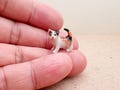 Handmade Tiny Ceramic Calico Cat Figurine: Collectible Kitten Decor product logo