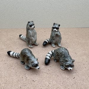 Hand-Painted Ceramic Raccoon Figurine Set of 4 | Woodland Animal Decor | Rustic Home Accent | Cute Wildlife Gift
