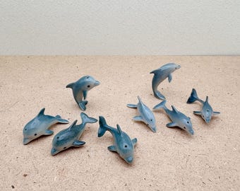 Handcrafted Ceramic Dolphin Figurines: Coastal Decor, Set of 4