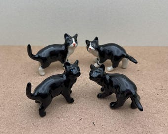 Vintage Black Ceramic Cat Figurines: Miniature Shelf Decor