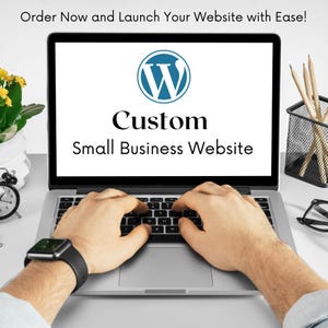 May include: A person is typing on a laptop computer with the words "Custom Small Business Website" displayed on the screen. The WordPress logo is also visible on the screen.