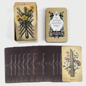 Caja metálica del Tarot de Anatomía Antigua con Guía. Baraja de adivinación botánica ocultista vintage.