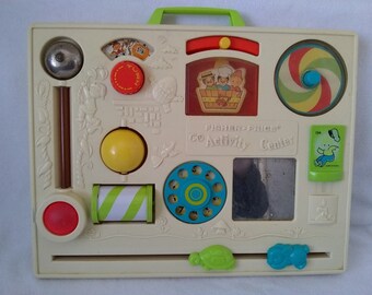 fisher price activity centre cot