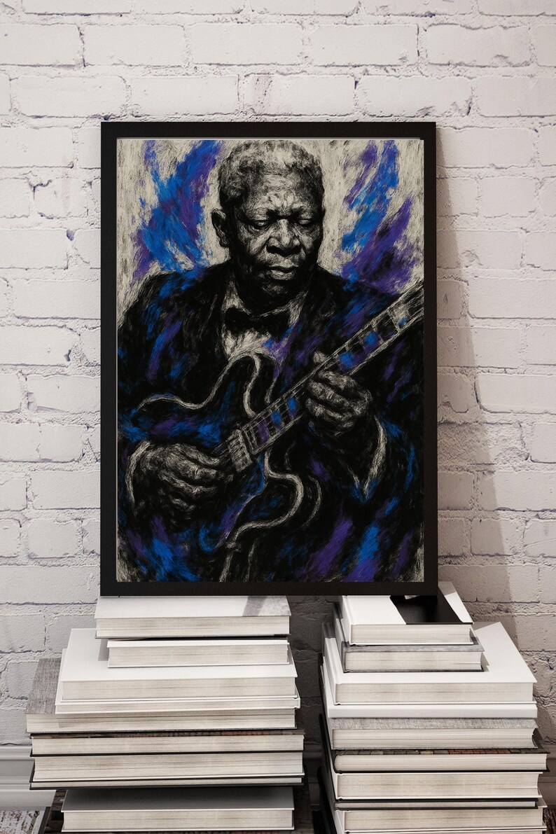 May include: A framed artwork featuring a portrait of a musician playing a guitar. The artwork is rendered in shades of black, blue, and purple, with a focus on the musician's face and hands. The guitar has a blue and purple design. The artwork is displayed against a white brick wall.